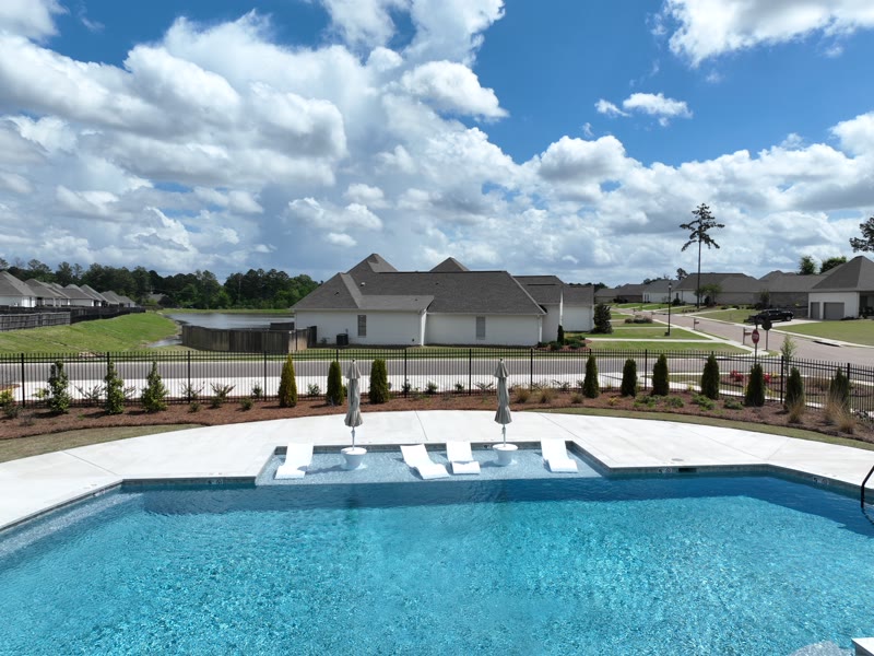 Poolside seating at the Thornberry community pool