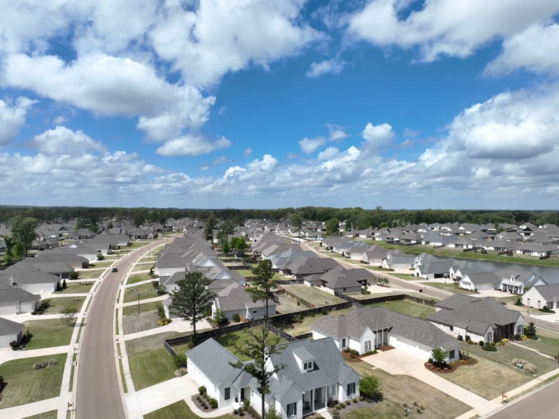 Rooflines beneath a Mississippi sky