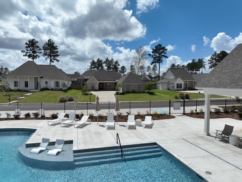 Pool loungers and pavilion